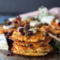 Close up of a stack of potato pancakes showing the golden crisp crust