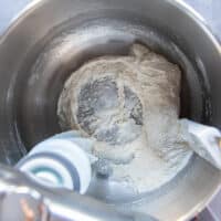The starter being mixed in a bowl of the kitchen machine
