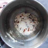 Next day dough ingredients added to the kitchen machine to for, the fougasse dough