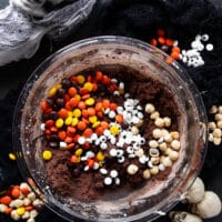 Spooky add ins to the cookie batter including nuts, halloween M7Ms and candy eye balls