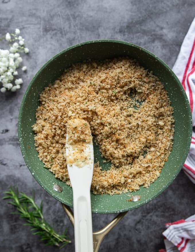 Golden and toasty garlic herb breadcrumbs in a skillet. 