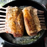 Flipped rack of lamb showing the golden sear