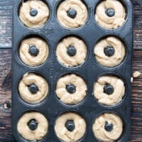 apple cider donuts recipe in a donut pan ready to bake