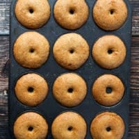 baked apple cider donuts out of the oven puffy and gorgeous