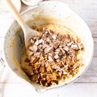 Optional chocolate chunks and chopped pecans are added to the batter to be folded in to complete the banana bread muffins batter