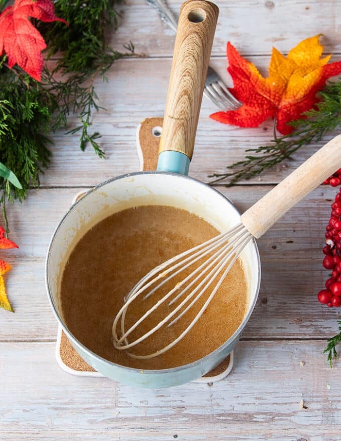 The honey, light brown sugar and butter mixture have dissolved completely in the sauce pan using a whisk