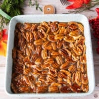Pecan pie filling is now poured over the crust and ready to go into the oven to bake