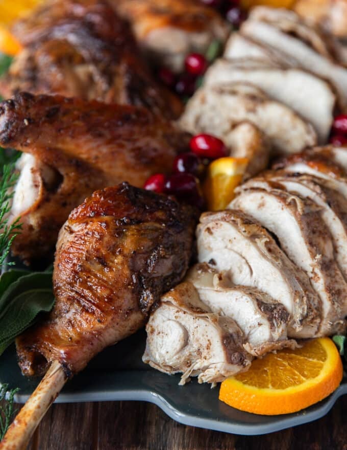 close up of a sliced turkey breast showing how juicy it is after spatchcock turkey is done