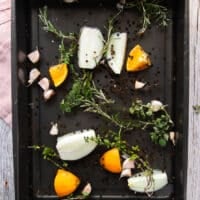 All the brine ingredients mixed together in a large roasting pan