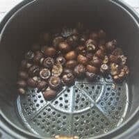 Cooked mushrooms in the air fryer basket