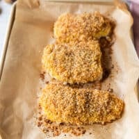 cod fillets on a baking sheet out of the oven