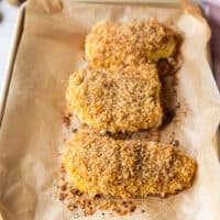 cod fillets on a baking sheet out of the oven