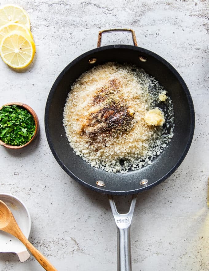The panko coating for the baked cod is all added into a small skillet and tossed together 