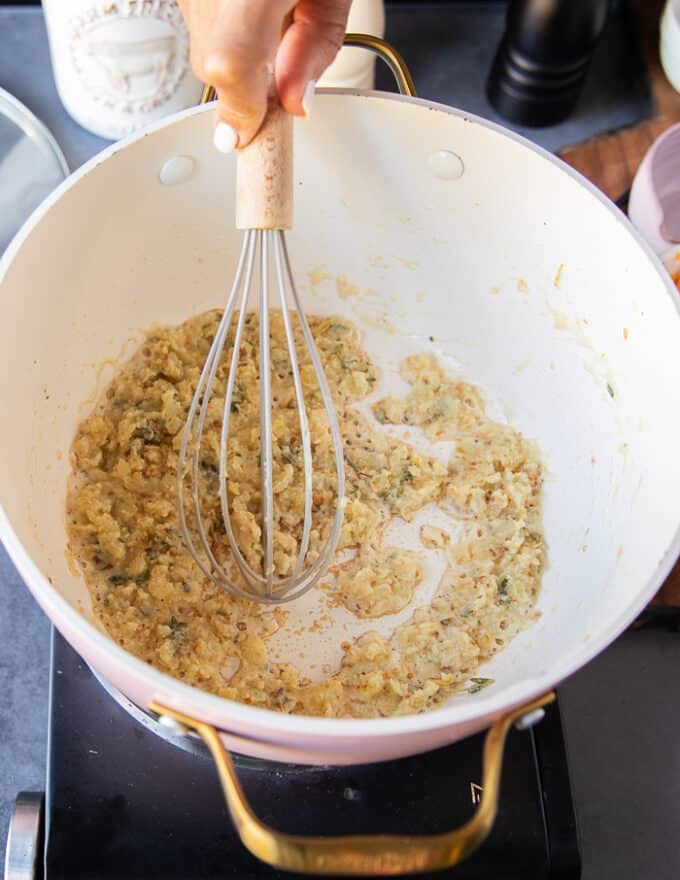 the flour is cooked in the butter until lightly golden so it's ready to add stock 