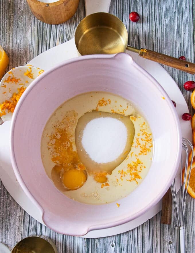 One large bowl with eggs, sugar, oil, orange zest, milk and orange juice added in 