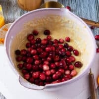 fresh cranberries added on to the batter to make cranberry orange muffins