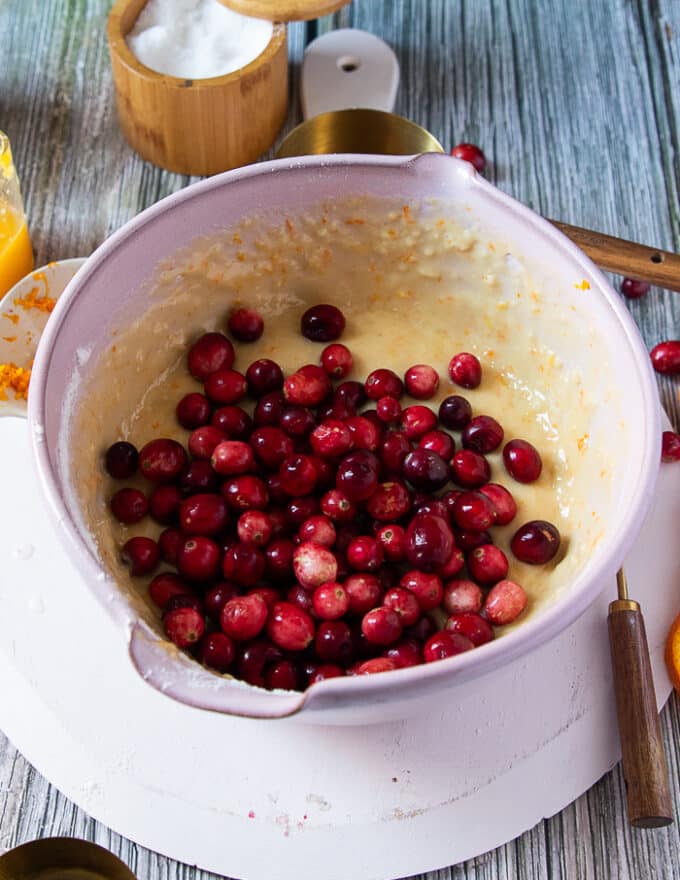 fresh cranberries added on to the batter to make cranberry orange muffins