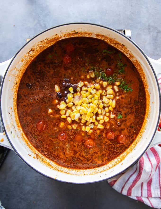 The black beans and corn are now added to the pot of taco soup