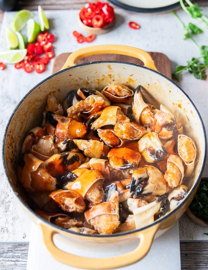 Crab Claws fully cooked in the pot which could be done in the oven or on the stove