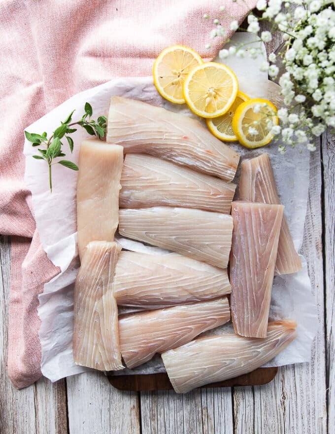 A plate of mahi mahi fillets to cut into sticks for fish fingers