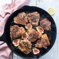 Lamb loin chops flipped and golden on the top now cooking in the pan until ready