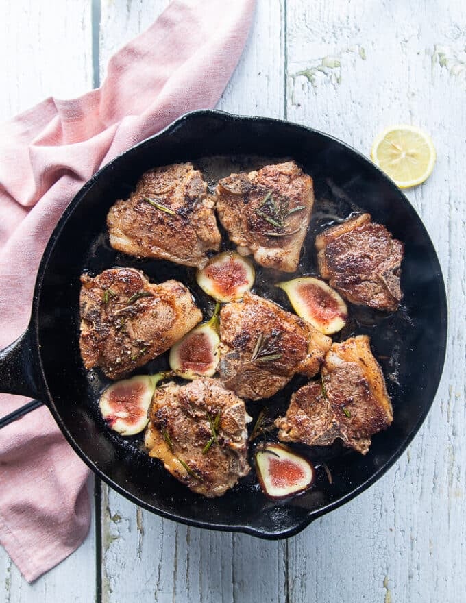 Lamb loin chops flipped and golden on the top now cooking in the pan until ready 