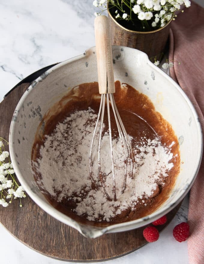 cocoa powder and flour added on to the batter 