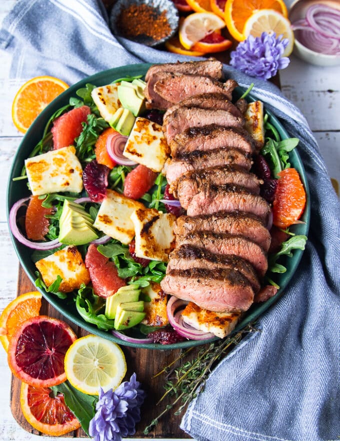 Sliced Lamb Loin cooked and served over the halloumi salad 