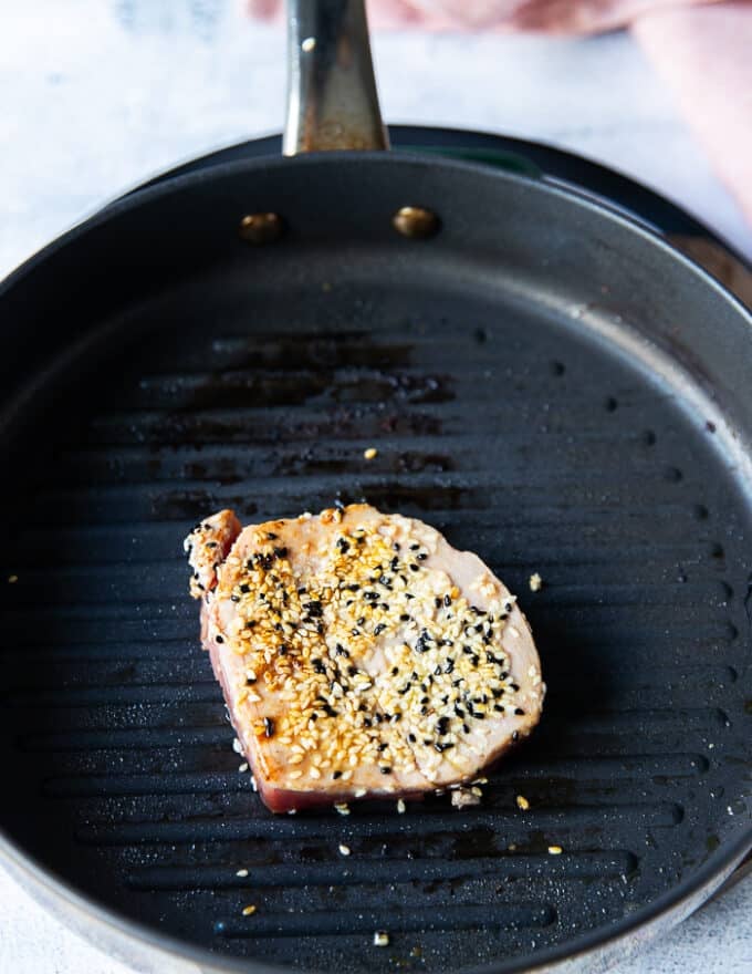 Seared ahi tuna in a grill pan ready 