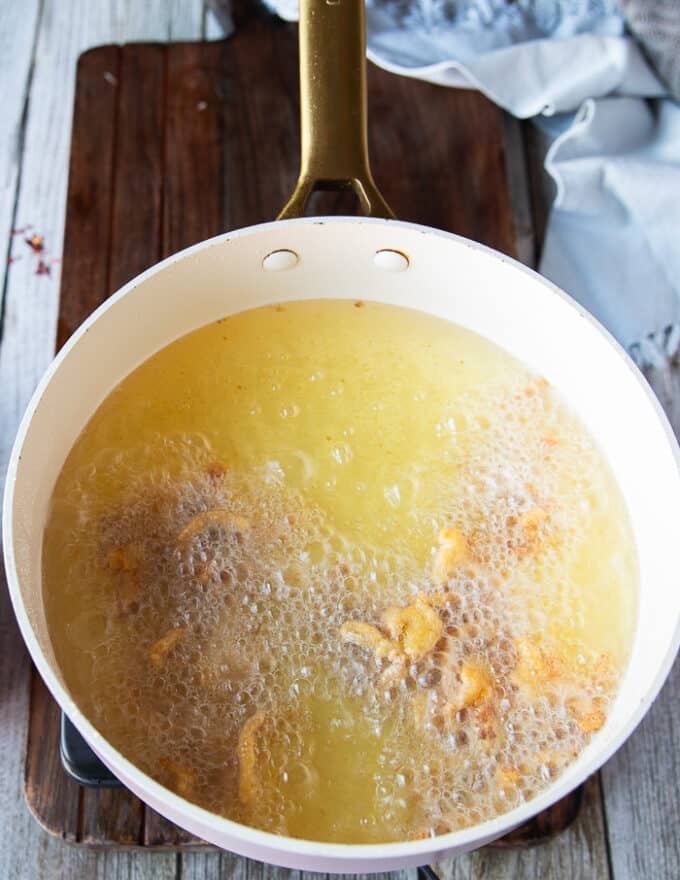 The shrimp frying in the hot oil 