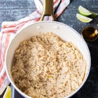 fully cooked fluffy long grain rice in a pot