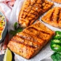 close up of grilled trout showing the grill marks and cooked fish