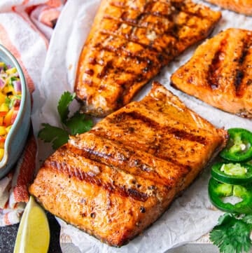 close up of grilled trout showing the grill marks and cooked fish