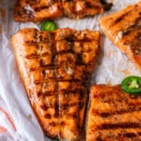 close up of the grilled trout out of the grill basket showing the beautiful grill lines and perfectly juicy fish