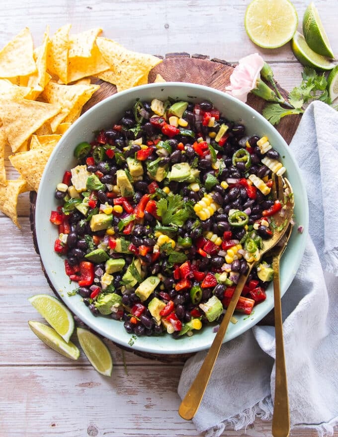 Black bean and corn salad ingredients all mixed together with the dressing and ready