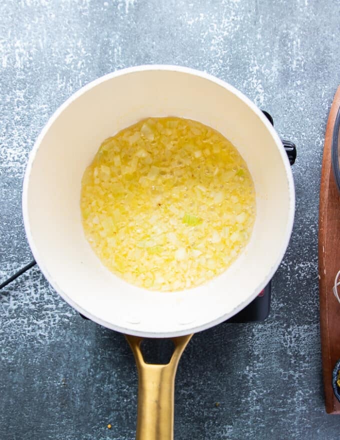 butter and onion in the post sautéing to make the base for the queso recipe