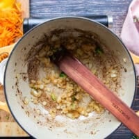 light golden and softened onions cooked as the base of the soup and the garlic is added.