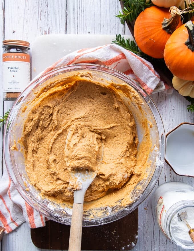 A spatula in the pumpkin bread batter showing the texture of the final batter 