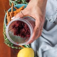 A mini processor bowl with minced cranberries