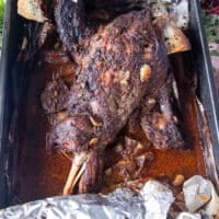 lamb shoulder roast is ready uncovered and tender out of the oven