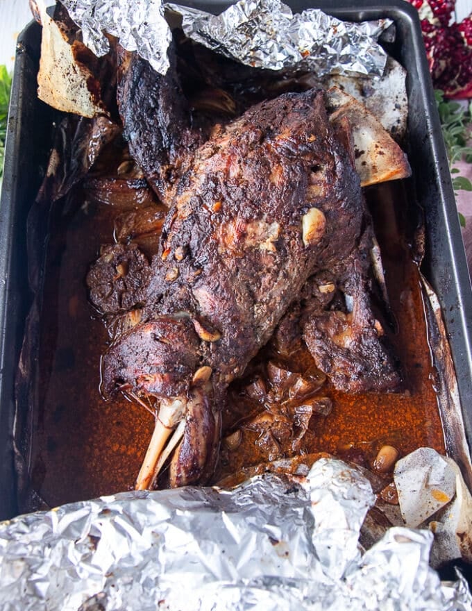 lamb shoulder roast is ready uncovered and tender out of the oven
