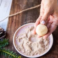 A rolled out cookie dough ready to coat in vanilla sugar