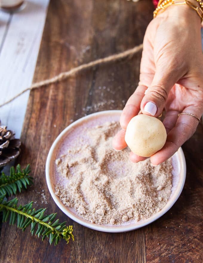 A rolled out cookie dough ready to coat in vanilla sugar 