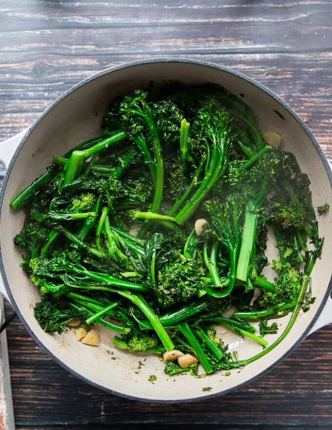 perfectly cooked and ready broccoli rabe in a skillet