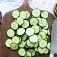 Sliced cucumbers ready on a cutting board