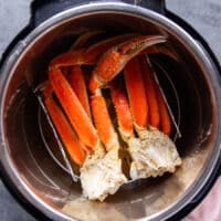 steamed crab legs ready in a steamer pot