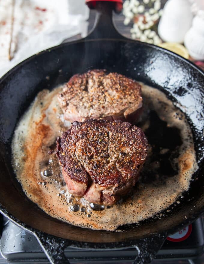 Golden fillet mignon flipped on the other side to show the golden crust