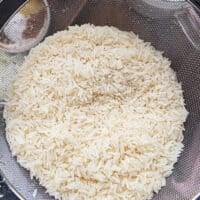 long grain basmati rice rinsed and drained in a colander