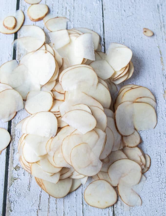 All the potatoes sliced thinly