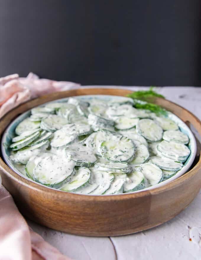 side view of the creamy cucumber salad showing the texture of cucumbers and sauce
